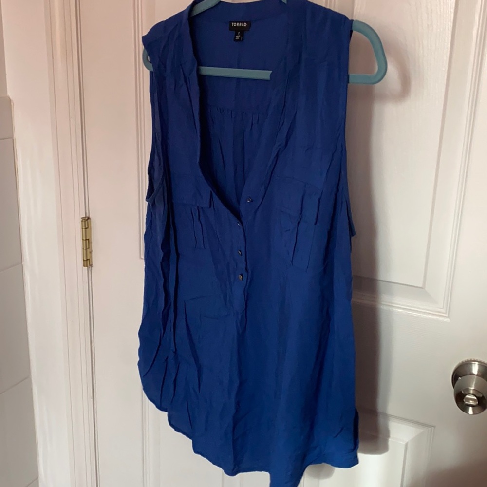Lightly worn blue sleeveless Tori’s top